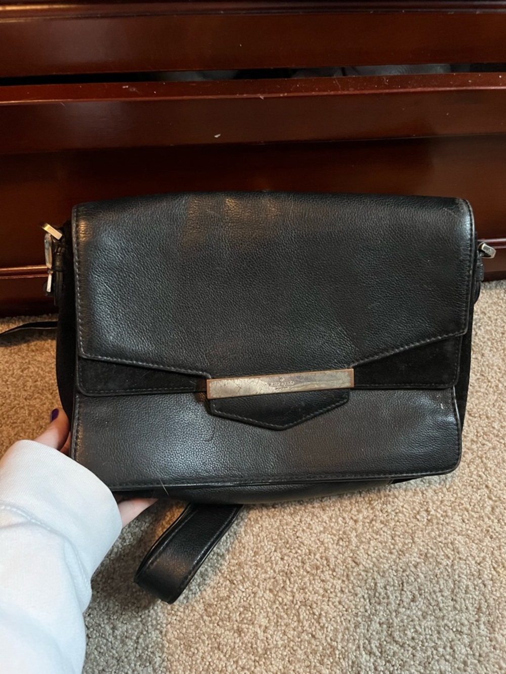 Kate Spade Black Leather Crossbody Bag with Metal Accent